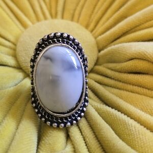 Silver ring with white stone